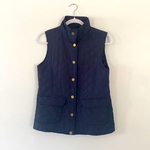 Women’s button-up blue vest
